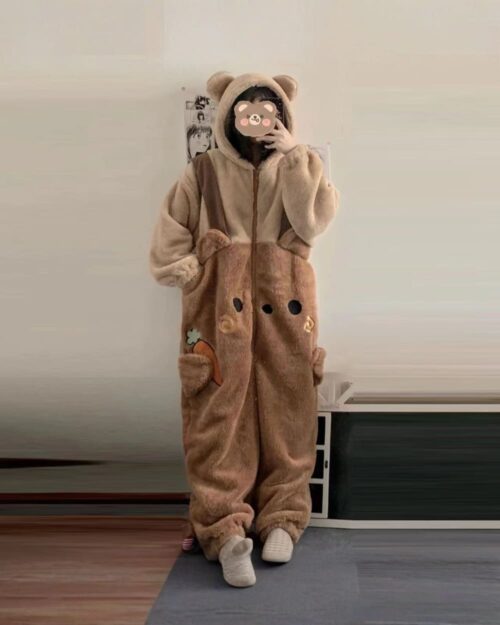Woman wearing brown bear fluffy pajamas, a cozy kawaii clothes set.
