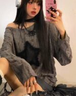 Off Shoulder Star Top - Grunge Aesthetic featuring a distressed, layered fabric design.