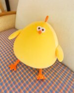 Kawaii Super Chonky Yellow Plushie - Goofy Edition, a plump, orange-yellow chonky bird plushie.