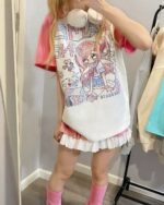Pink kawaii t-shirt with anime-style graphic, cutecore aesthetic.