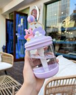 A kawaii bear bottle - U Cup showcasing a pink and purple design with a straw.