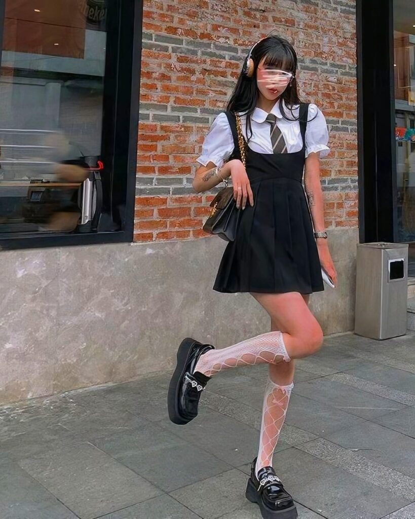 Black korean aesthetic dress with white collar shirt and chunky boots, street style.