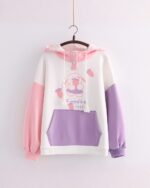 Kawaii happy rabbit hoodie featuring a cute rabbit graphic and color-block design.