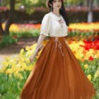 Retro Style Dress - Cottagecore aesthetic dress in a floral setting.