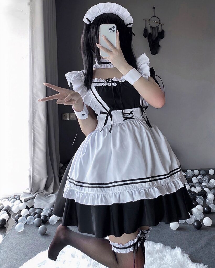 Soft Girl Japanese Lolita Maid Costume in black and white, complete with accessories.