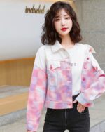 Pink korean jacket with a checkered and white design on a model.