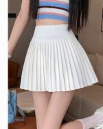 White korean pleated skirt with a high waist and pleats, preppy style.