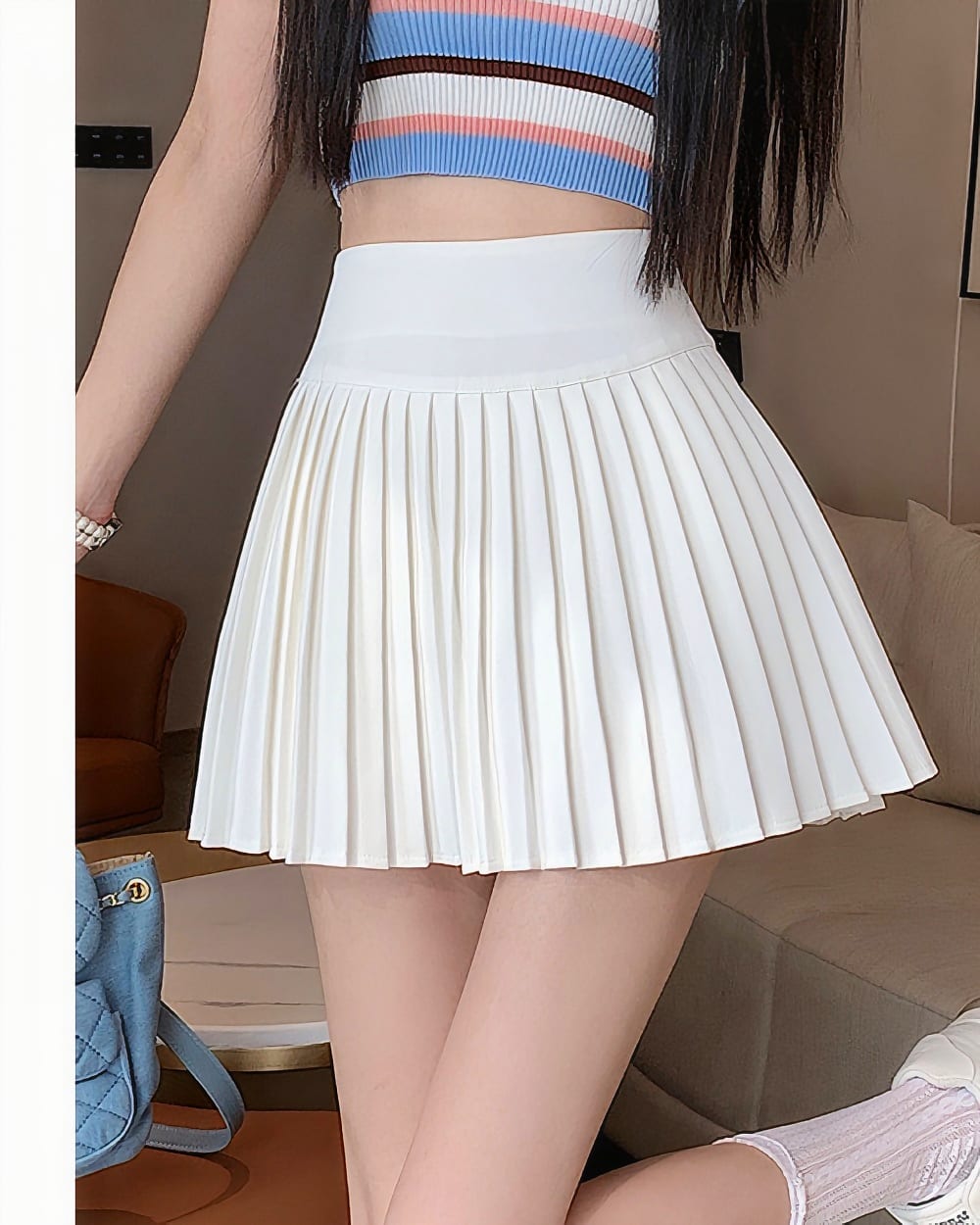White korean pleated skirt with a high waist and pleats, preppy style.