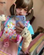 Person wearing a Kawaii Pastel Mezzo Piano T-Shirt, taking a selfie.
