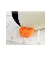 Close-up of Pip the Chonky Penguin Plushie's orange foot.