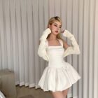 White sleeveless collar dress, a coquette aesthetic dress, with matching knitted sleeves.