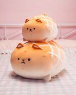 Two kawaii melonwan dog plushies stacked together, soft and cuddly.