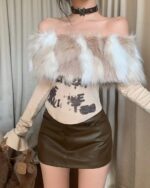 Short fluffy top in y2k aesthetic with faux fur trim and graphic print.