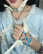 Close-up of Winged Love Bracelets - Harajuku Aesthetic worn on the wrist.