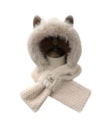 Fluffy fox ear beanie, a knitted winter hat with faux fur accents.