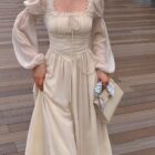 Cream Long Sleeve Fairy Dress featuring lace detailing and puff sleeves.