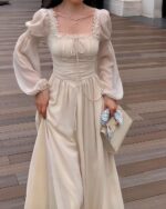 Cream Long Sleeve Fairy Dress featuring lace detailing and puff sleeves.