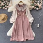 Pink french aesthetic dress featuring puff sleeves and a collared neckline.