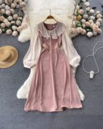 Pink french aesthetic dress featuring puff sleeves and a collared neckline.