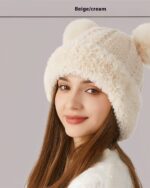 Beige/cream bear ears hat, a knitted winter cap with attached plush pom-pom ears.