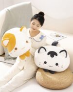 Kawaii cat plushie, a soft, white and brown marshmallow-style plush toy.