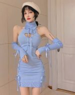 Light blue hollow-out mini dress with a high neck, tie sleeves, and lace detailing.