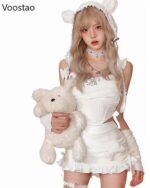 Model wearing a kawaii coquette set, including a corset, skirt, and lace gloves, with a bear plush.