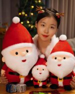 Christmas plushie decor featuring Santa Claus plush toys in a festive setting.