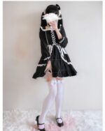 Black lace chibi gothic lolita dress with white trim and stockings.
