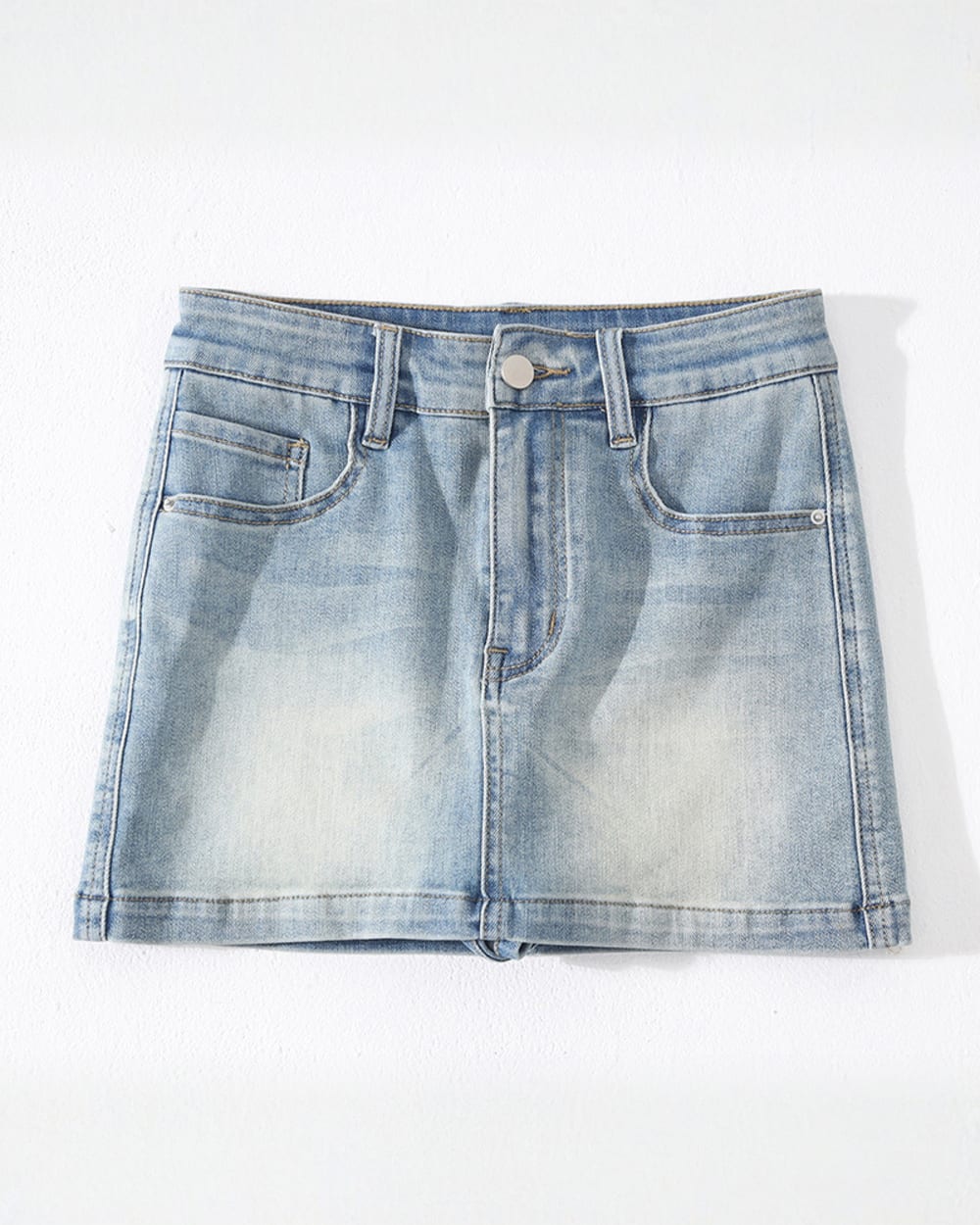 High Waist Denim Skirt - Y2K Denim Skirt, light wash, denim mini skirt with button closure.