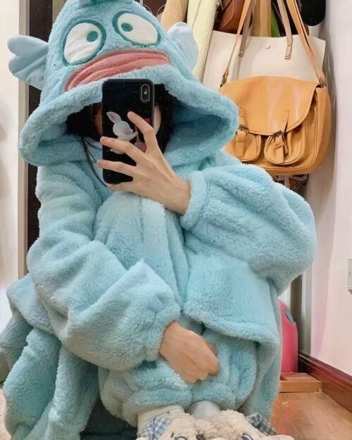 Fluffy kawaii animal pajamas featuring a blue frog design.