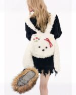 White and black plushie korean style backpack with rabbit details.