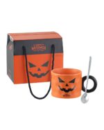 Halloween pumpkin cup featuring a jack-o'-lantern design with a spoon and black accents, displayed with its packaging.