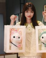 Cotton the Adventurous Rabbit kawaii bunny plushie displayed in a gift bag.