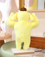 Yellow sanrio muscular plushie displaying exaggerated biceps and a zipper closure.