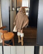 Pastel hooded sweater in a brown, fuzzy knit. Comfortable and stylish outerwear.