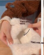 Close-up view of Kawaii cat slippers showing plush lining and thick sole for warmth.