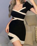 Black and white korean aesthetic dress with square collar and lace trim. Fits a person well.