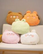Set of kawaii animal plushie cushions in various colors and designs.