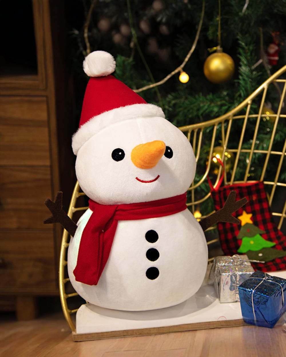 Cute snowman christmas plushie decor, festive holiday decoration with hat and scarf.
