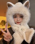 Fluffy fox ear beanie featuring a soft, faux fur design for winter wear.