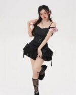 Black french style bow skirt with ruffle details and pink accents, Y2K aesthetic.