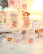 A selection of kawaii pen holders featuring cute animal designs, including a bunny and bear. A charming kawaii pen holder.