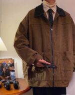 Brown corduroy korean college jacket with pockets and a collar.