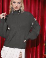 Dark loose pullover sweater with gothic aesthetic embroidery details.