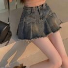 Retro Pleated Mini Skirt - Y2K aesthetic skirt in denim, featuring a gathered and frayed hemline.