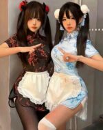 Two young women wearing a maid hanfu dress, featuring floral patterns and a ruffled skirt.