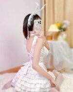 Bunny girl maid costume featuring a frilly dress, headband, and stockings. Kawaii clothes outfit.