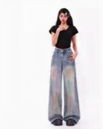 Colorful y2k aesthetic jeans, wide-leg denim pants featuring a rainbow fade wash.