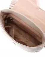 Interior view of a vegan leather Jirai kei bag featuring a lined compartment and zipper.